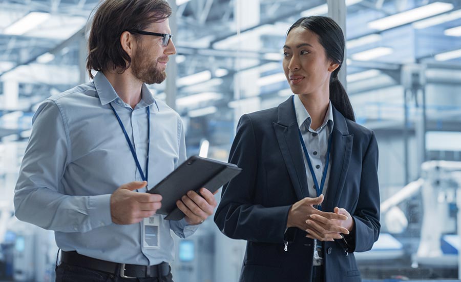 Two skilled professionals discussing a project