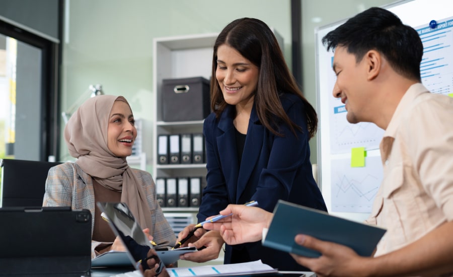 A smiling team of employees